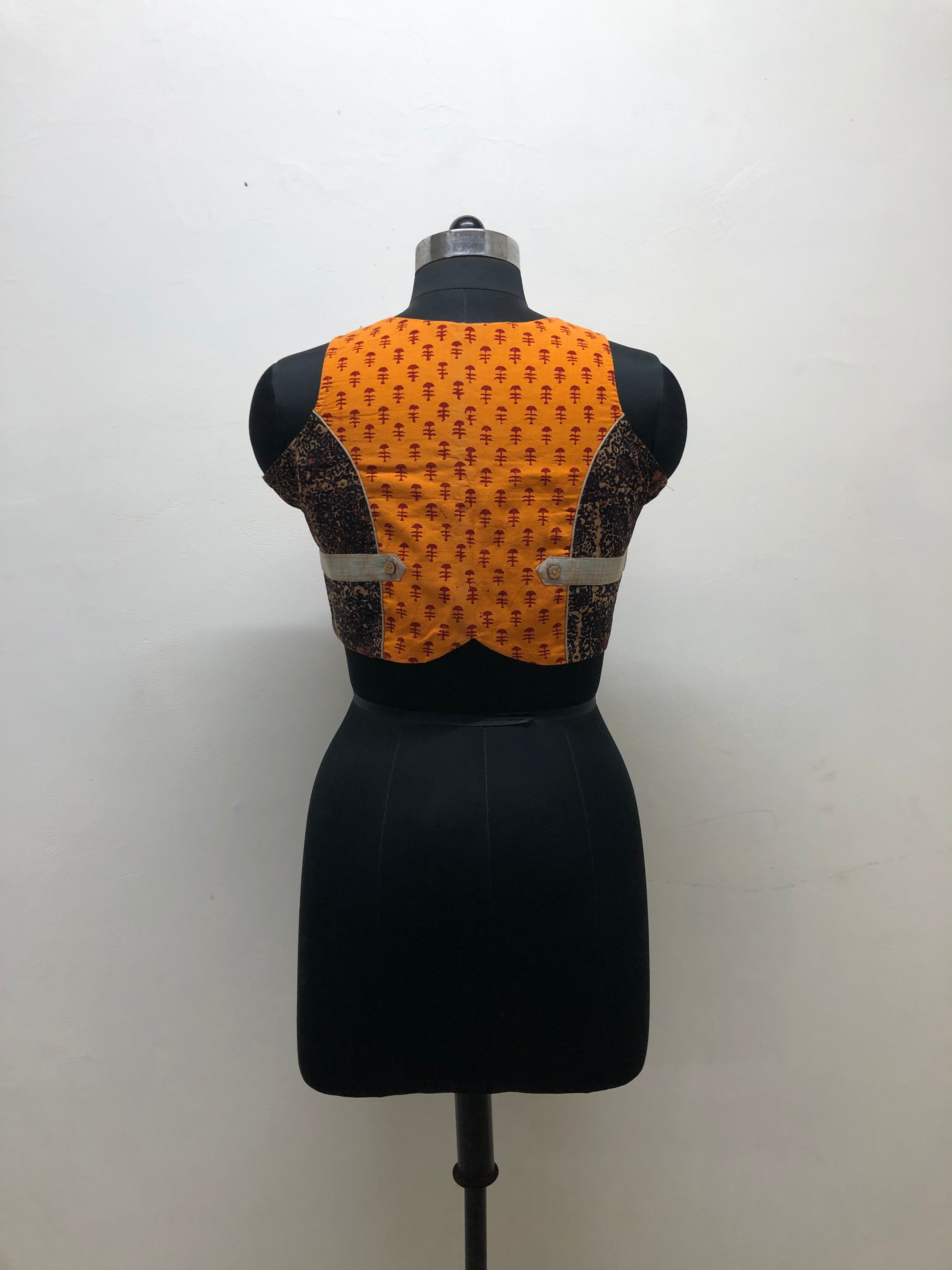 Black and Orange Sleeveless Blouse with Cutout - Prathaa - weaving traditions