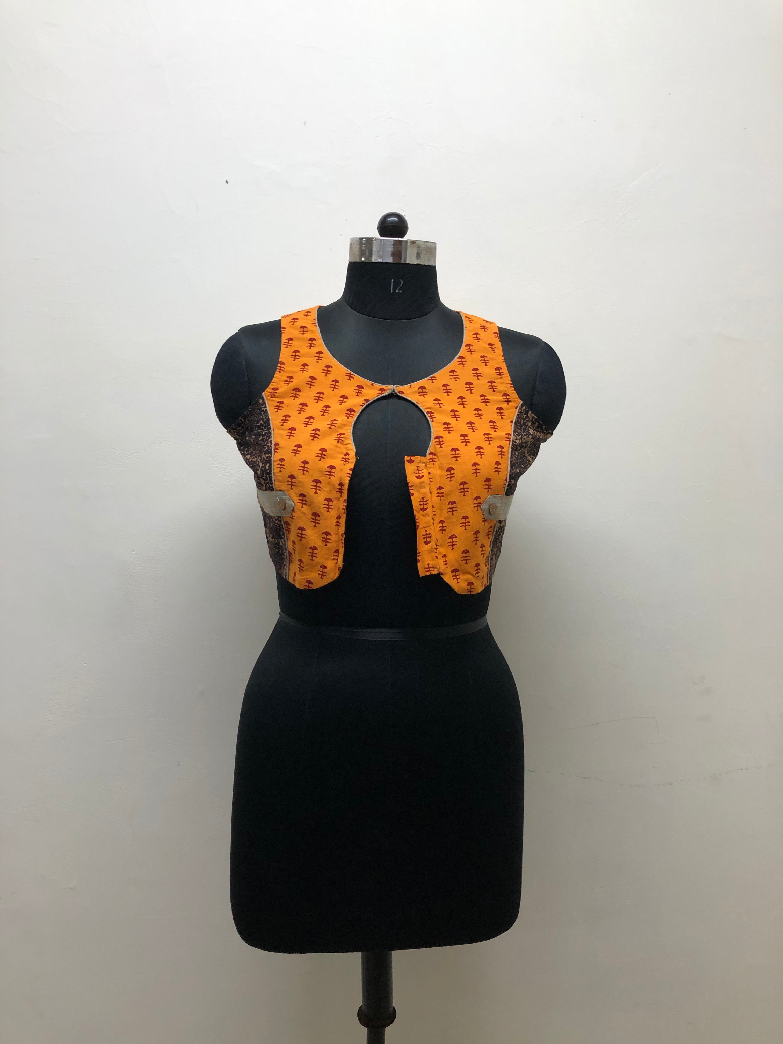 Black and Orange Sleeveless Blouse with Cutout - Prathaa - weaving traditions