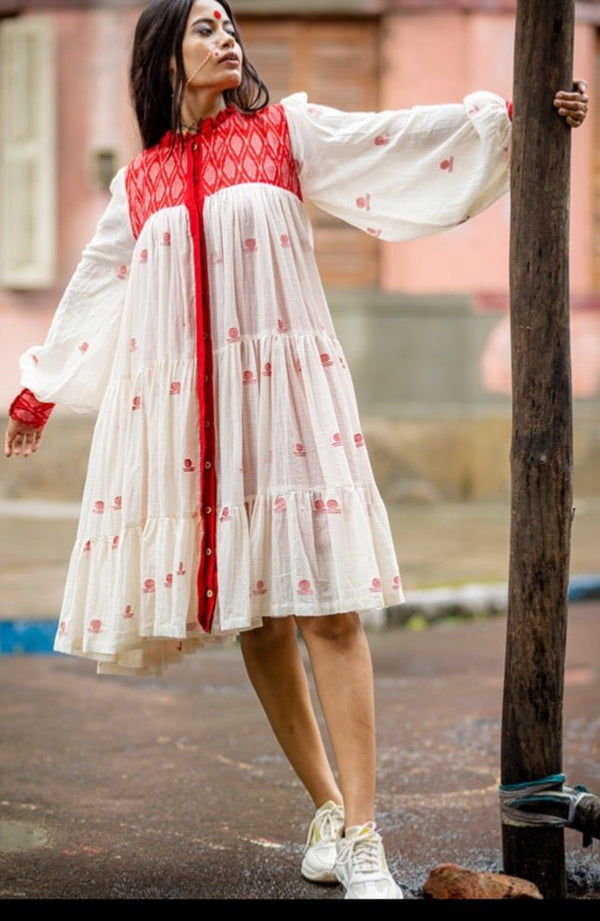 Red and White Jamdani Cotton Three Tier Debi Flare Dress from Prathaa, styled for Dashami